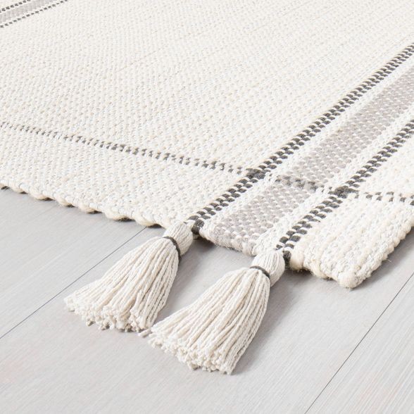 2' x 3' Simple Border Stripe with Corner Tassel Rug  White/Gray - Hearth & Hand with Magnolia
