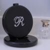 Black Dual Magnifying Mirror w/ Crystal Initial by Lori Greiner Black Dual Magnifying Mirror w/ Crystal Initial by Lori Greiner